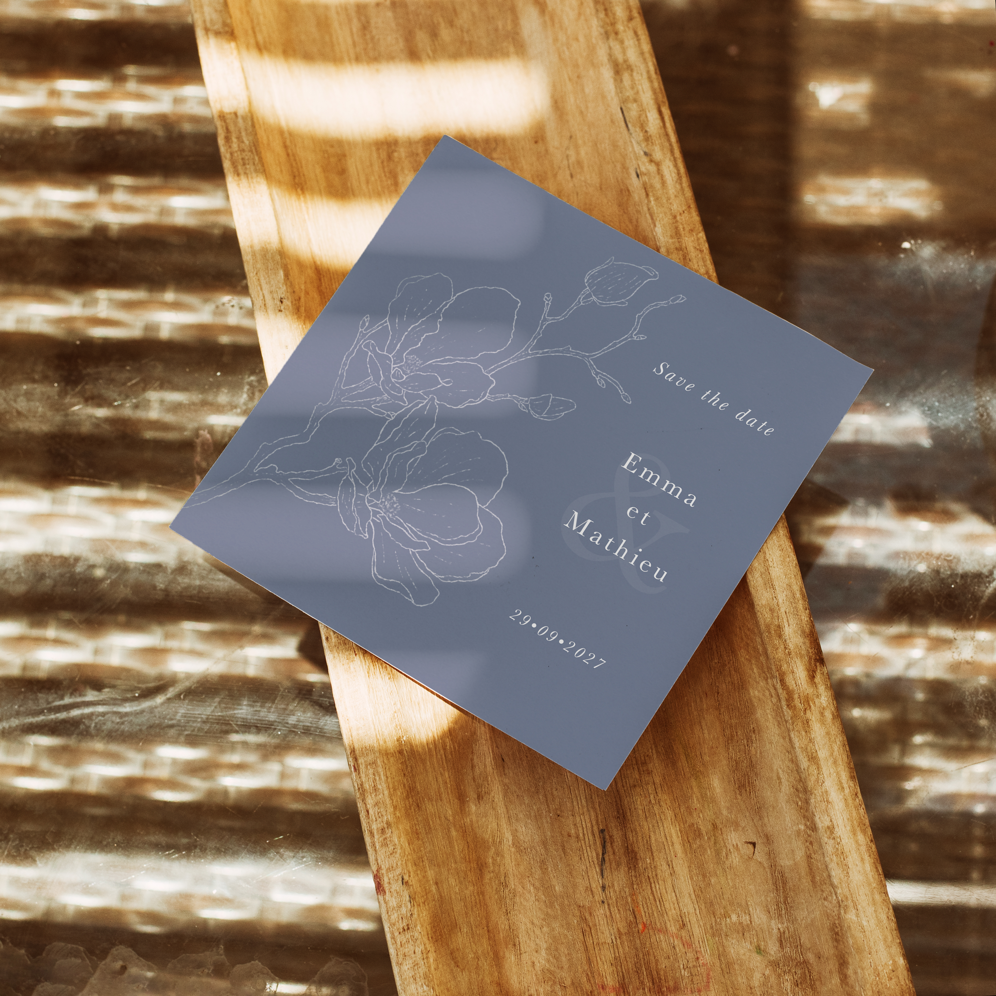 Outline Flower Blue - Discover our square-format digital invitation card. Set against a deep blue background, it highlights delicately embossed flowers, adding a touch of sophistication. Its simple yet elegant design makes it the perfect choice for all your special occasions.